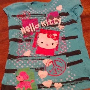 A blue hello Kitty shirt